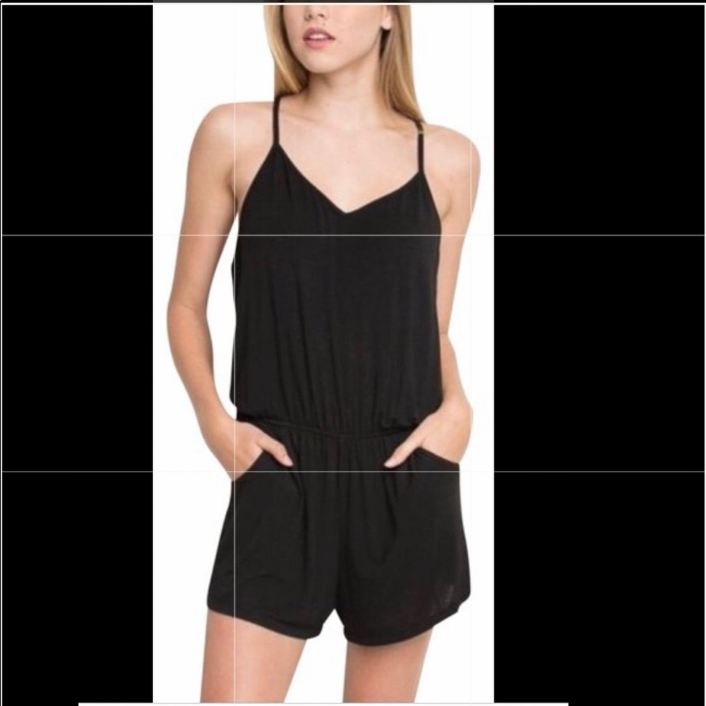 Brandy Melville black V Neck romper with Size pockets Size small.